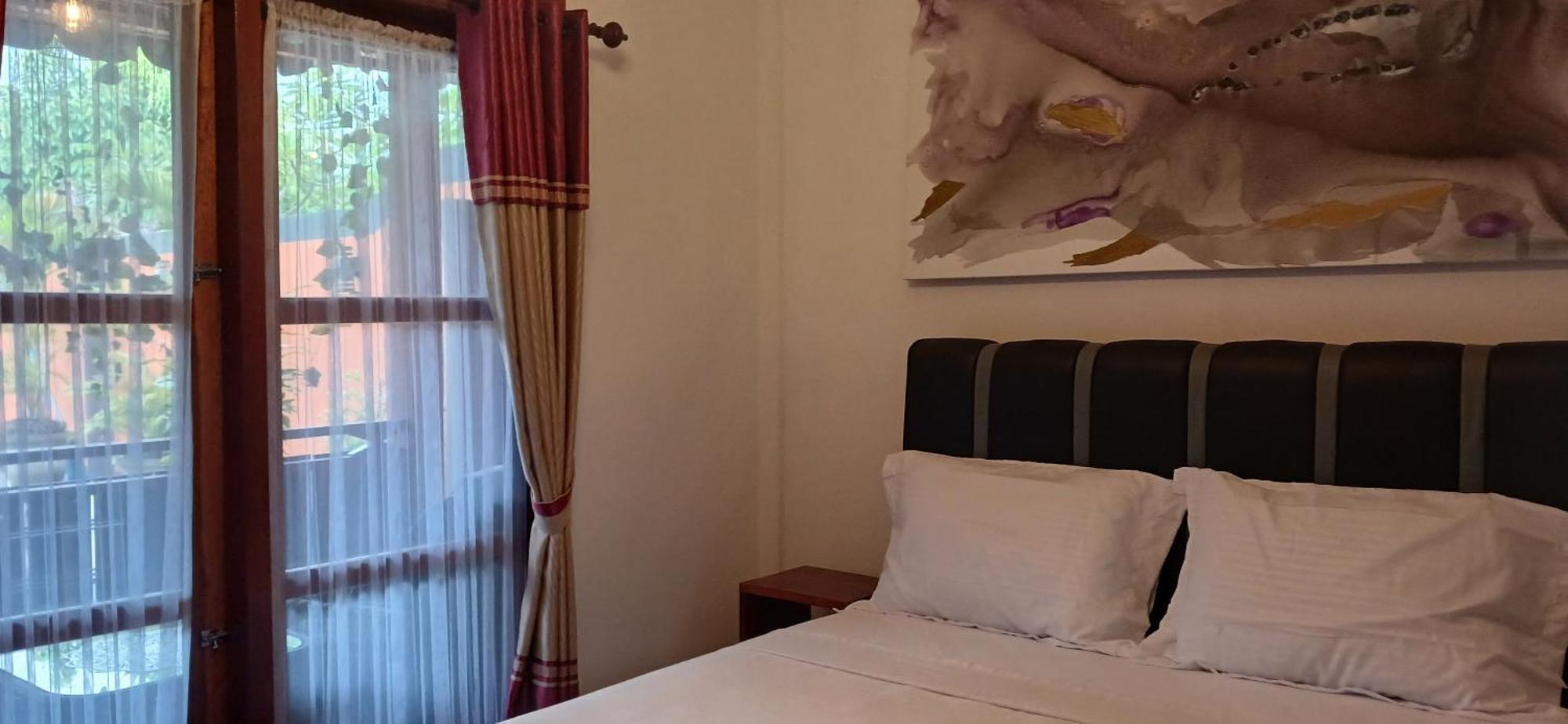 Dewi Sri Guesthouse Mataram Exterior photo